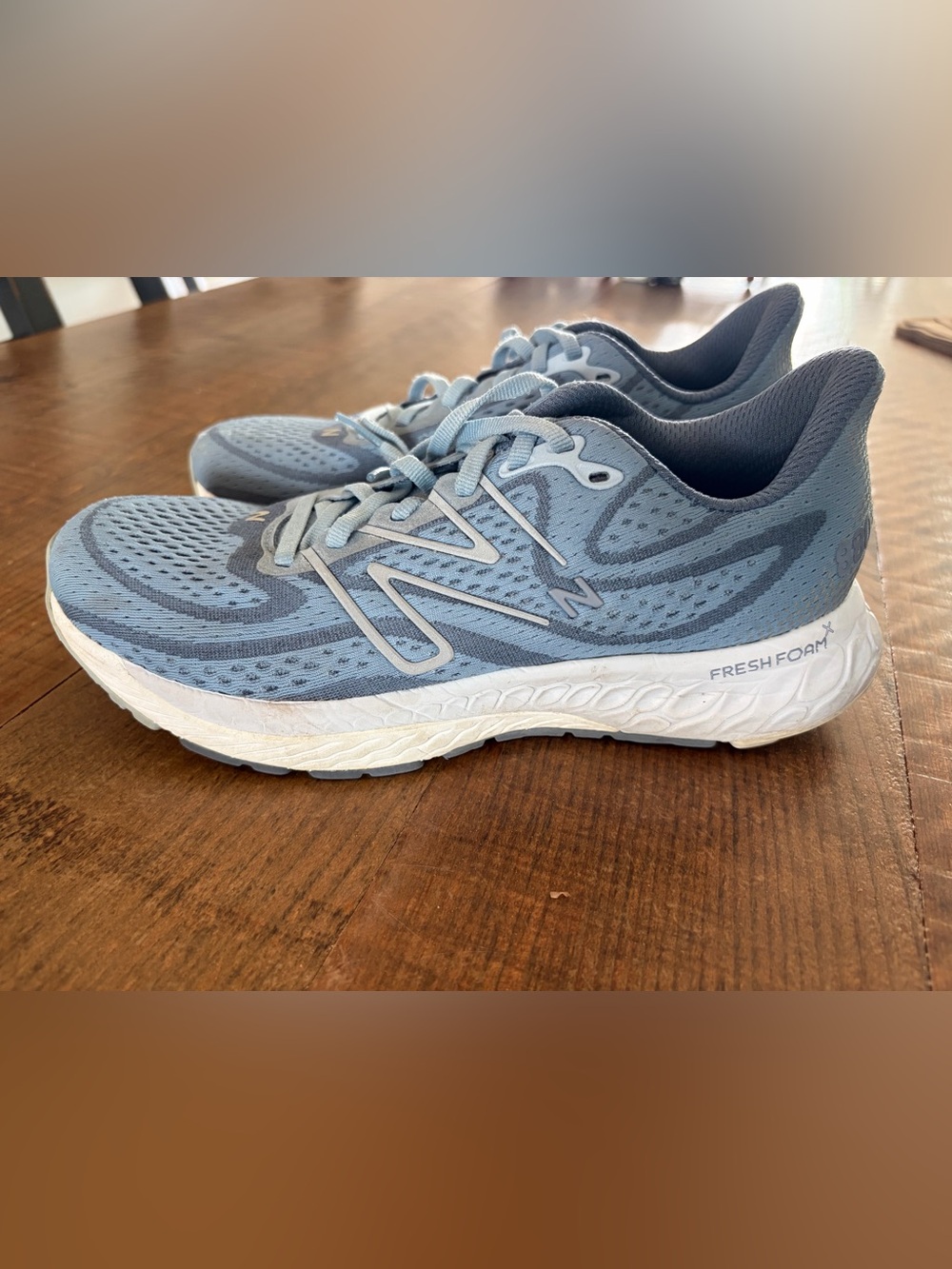 New Balance Women's Pale Blue Running Sneakers with Gray Accents